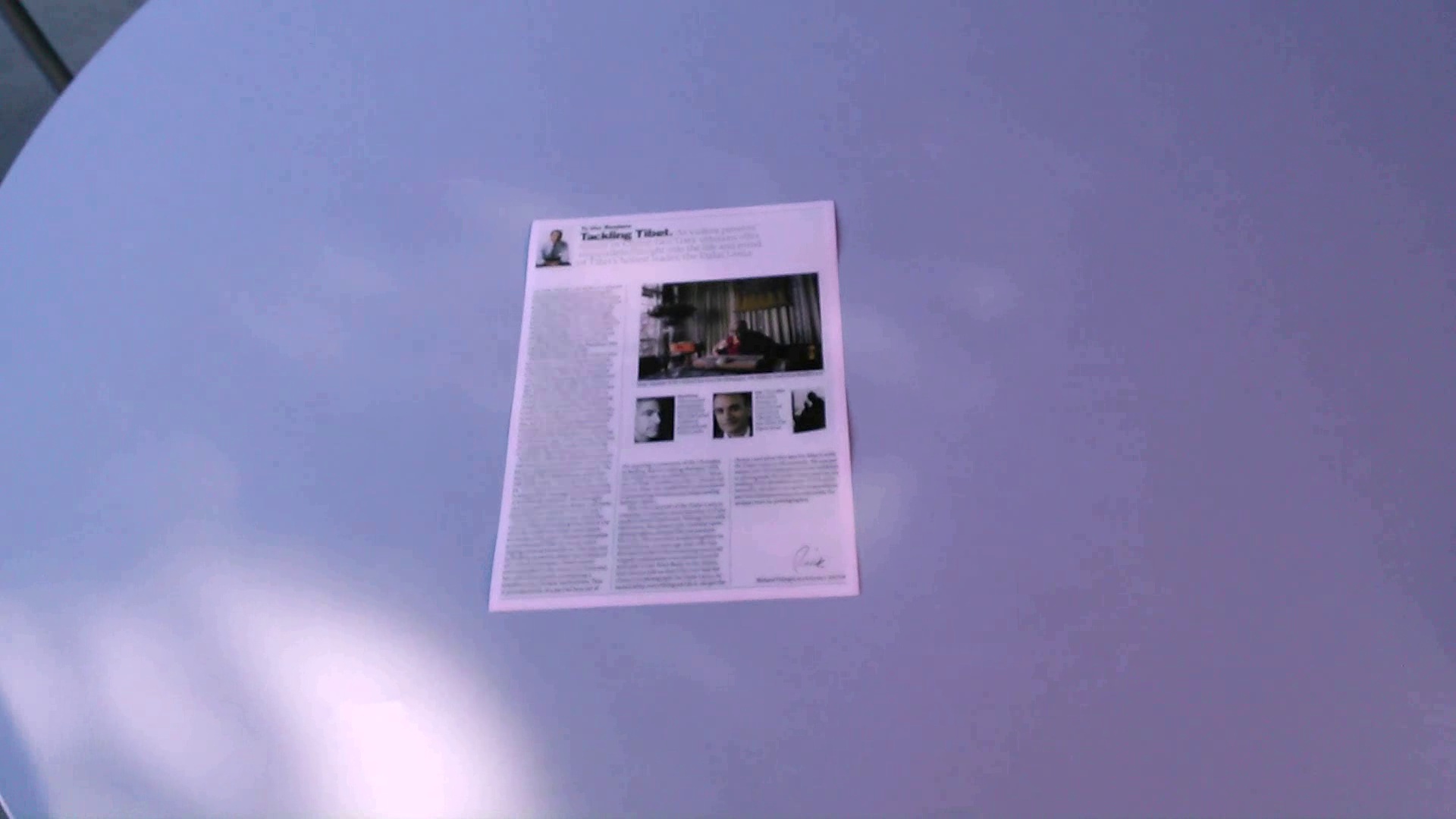 Angled phone photo of a magazine page